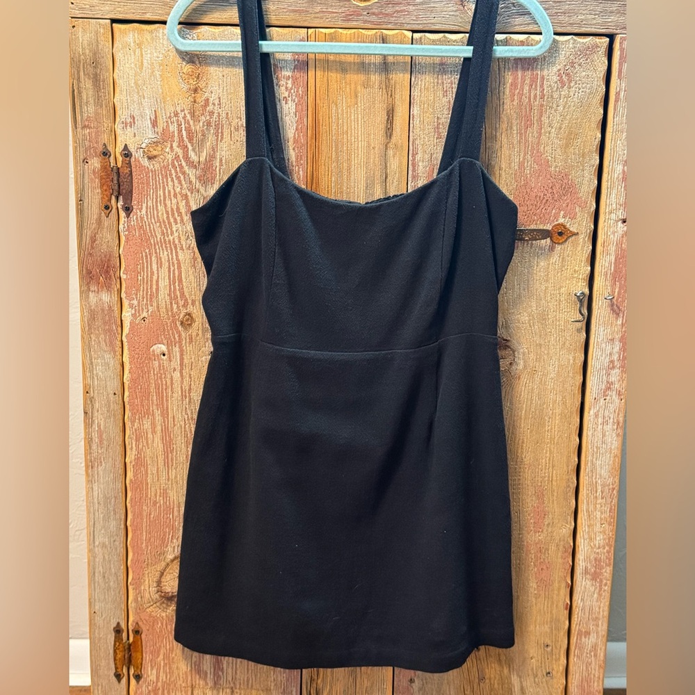 Free People little black dress, size small. Adjustable straps,smocked